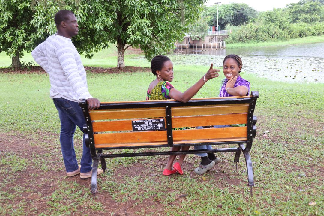 Staff seated on the bench; appreciation to David Sewell and the Retrobeights.